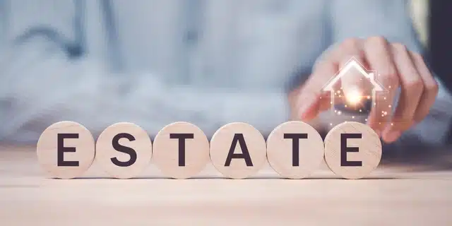 Real estate professional appraising a home's value for property tax purposes